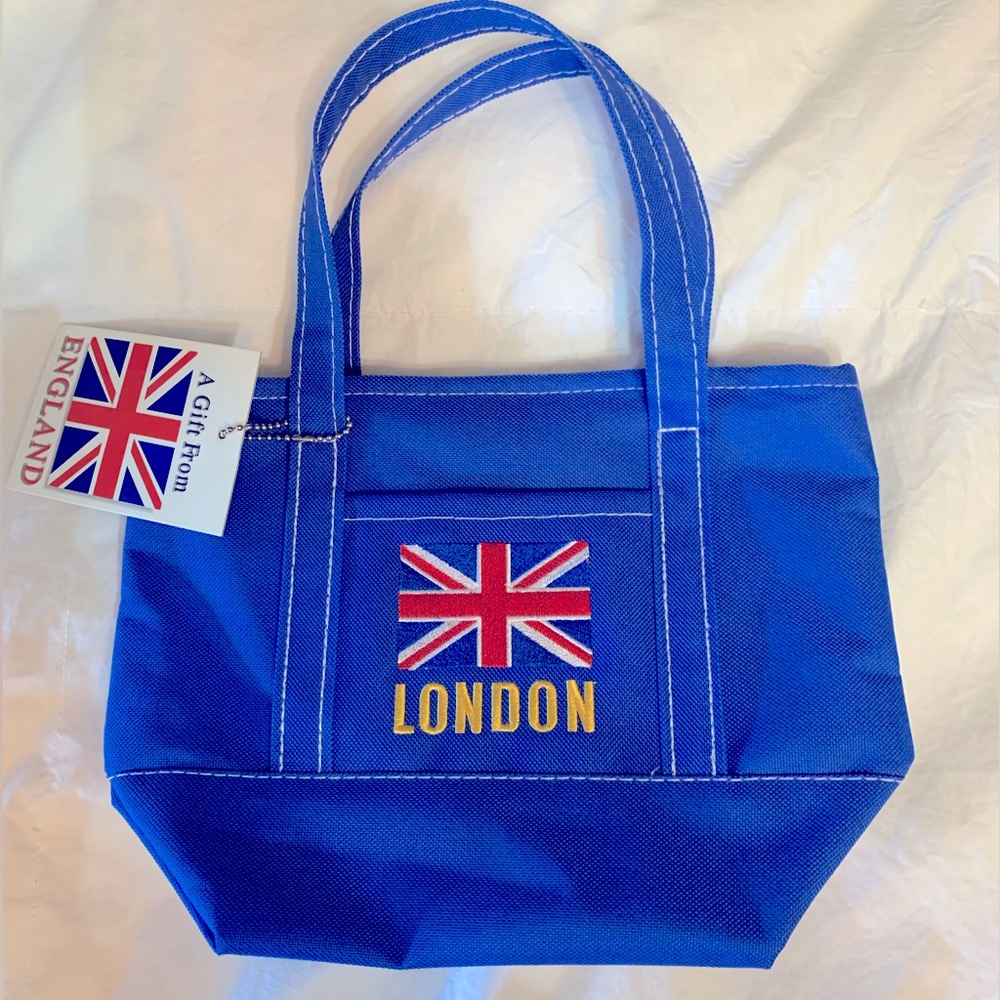Small blue Zip Purse. make-up bag. NEW. London.